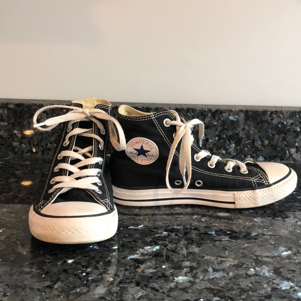 Black and white high top converse